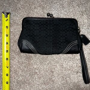 Vintage Coach Signature black canvas kiss lock wristlet